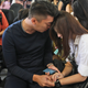 Relatives of the passengers of AirAsia flight QZ8501 comfort each other at Juanda International Airport in Surabaya, East Java, Indonesia.